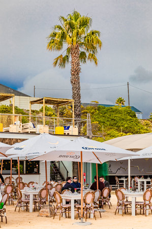 Cape Town, South Africa - May 12, 2022: Grand Africa Cafe and Beachfront bar and restaurantの写真素材