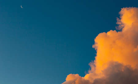 Cumulus and Stratus clouds in dramatic sunset sky over Cape Townの写真素材