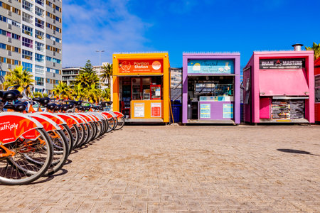 Cape Town, South Africa - May 12, 2022: Bicycle rental business on Sea Point beach front