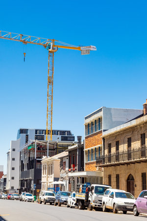 Cape Town, South Africa - December 7, 2022: Building construction site with large craneのeditorial素材