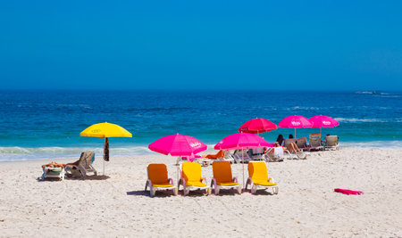 Cape Town, South Africa - February 13, 2023: View of vacationers on Camps Bay beachのeditorial素材