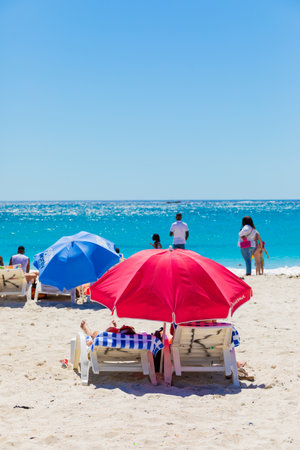 Cape Town, South Africa - February 18, 2023: View of vacationers on Camps Bay beachのeditorial素材
