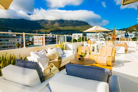 Cape Town, South Africa - November 15, 2022: Outdoor patio furniture on rooftop venue