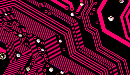 Macro Close up of printed wiring on green PC circuit board
