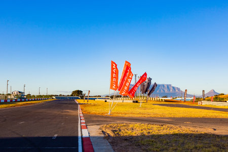 Cape Town, South Africa - February 24, 2023: Nissan vehicle branding flags at race trackのeditorial素材