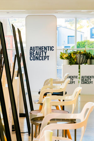 Cape Town, South Africa - November 15, 2022: Empty professional hair salon with large mirrorsのeditorial素材