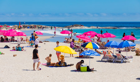 Cape Town, South Africa - February 19, 2023: View of vacationers on Camps Bay beachのeditorial素材