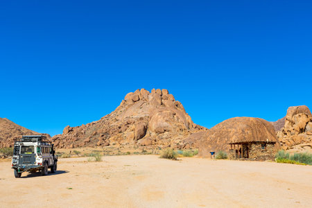 Richtersveld, South Africa - March 13, 2024: Old Land Rover Defender parked at a campsite in arid regionのeditorial素材