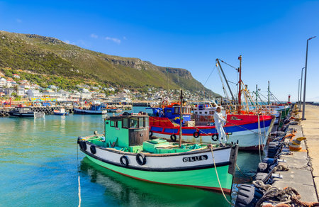 Cape Town, South Africa - December 11, 2023: Small Fishing Boats docked in Kalk Bay Harbourのeditorial素材