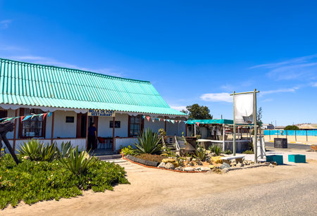 Port Nolloth, South Africa - March 16, 2024: Rustic beachfront bed and breakfast accommodations in small coastal townのeditorial素材