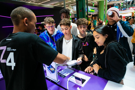 Cape Town, South Africa - October 22, 2022: Customer shopping for mobile phone in retail storeのeditorial素材