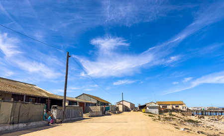 Port Nolloth, South Africa - March 16, 2024: Old rustic houses in fishing village in small coastal townのeditorial素材