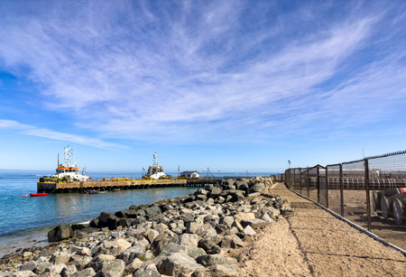 Port Nolloth, South Africa - March 16, 2024: Marine Diamond mining boats at a jetty in small coastal townのeditorial素材