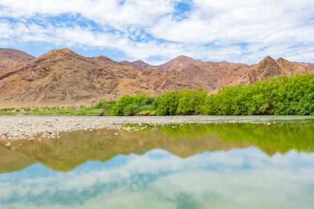 View of the Orange River at De Hoop camp site in the Richtersveld National Park, arid area of South Africaの写真素材