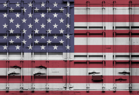 Shipping container with USA national flag overlay symbolising tariffs and international trade policies in global commerce contextの写真素材