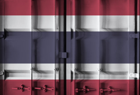 Shipping container with Thailand national flag overlay symbolising tariffs and international trade policies in global commerce contextの写真素材