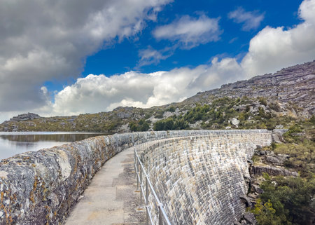 View of reservoir dam wall on top of Cape Town rugged mountains