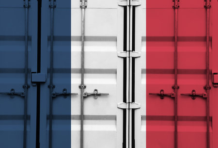 Shipping container with French national flag overlay symbolising tariffs and international trade policies in global commerce contextの写真素材