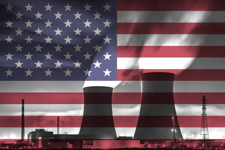 Nuclear Power Plant with American National Flag Overlay Symbolising Clean Energy Productionの写真素材