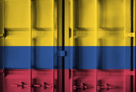 Shipping container with Colombia national flag overlay symbolising tariffs and international trade policies in global commerce contextの写真素材
