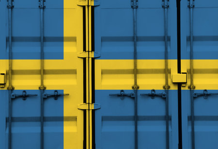 Shipping container with Sweden national flag overlay symbolising tariffs and international trade policies in global commerce contextの写真素材