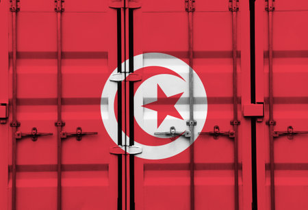 Shipping container with Tunisia national flag overlay symbolising tariffs and international trade policies in global commerce contextの写真素材