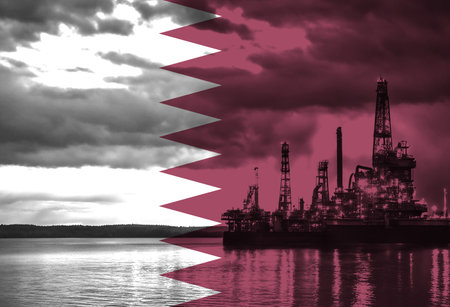 Natural Gas drilling rig with Qatar flag overlay symbolising natural resources in countryの写真素材