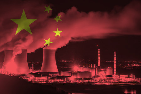 Nuclear Power Plant with Chinese National Flag Overlay Symbolising Clean Energy Productionの写真素材