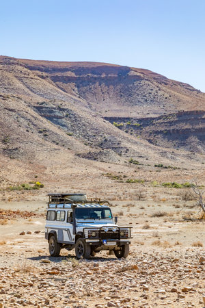 Karoo, South Africa - October 27, 2025: Old Land Rover Defender parked in an arid regionのeditorial素材