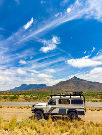 Karoo, South Africa - October 27, 2025: Old Land Rover Defender parked on a roadのeditorial素材