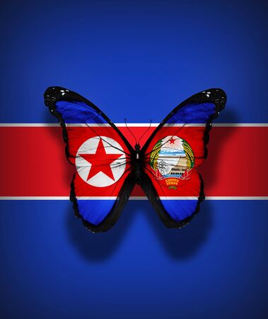 North Korea with coat of arms flag butterfly, isolated on flag backgroundの写真素材