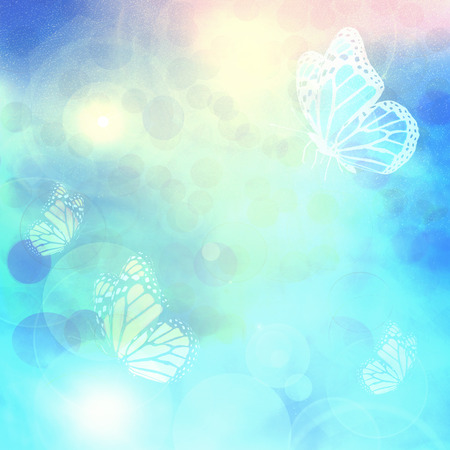 Sunshine with butterflies as abstract lights backgroundの写真素材