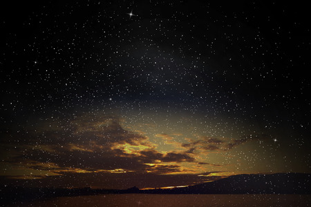 Universe filled with stars, nebula and skyの写真素材