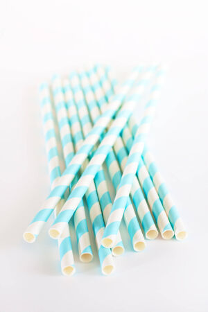 Paper straws for cocktails isolated on whiteの写真素材