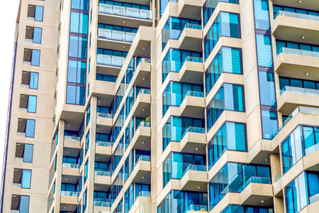 Closeup photos of dense apartment blockの写真素材