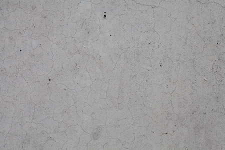 Concrete slab wall with hairline cracksの写真素材