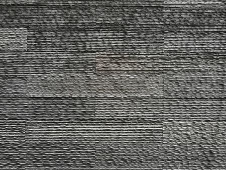 Grey stone tile wall patternの写真素材