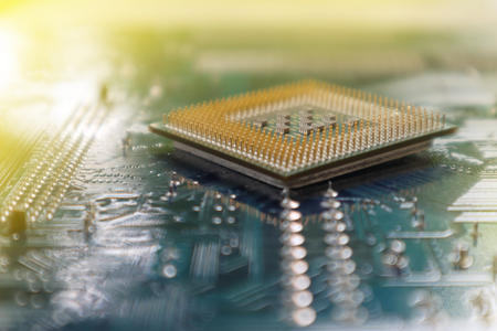 CPU for the socket of the computer motherboard. concept of computer hardware. repairing upgrade and maintenance technologyの写真素材