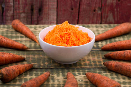 Carrots on an old tableの写真素材