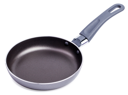 Black frying pan isolated on white background. Side viewの写真素材