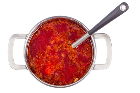 Hot borsch in a steel pan isolated on a white backgroundの写真素材
