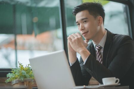 Successful entrepreneurs and business people achieving goals, Happy business people celebrating success at company, Business woman with arms up leading a successful team.の写真素材
