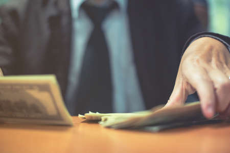 Businessman discussing strategy and planning project to investment in overseas Branchesの写真素材