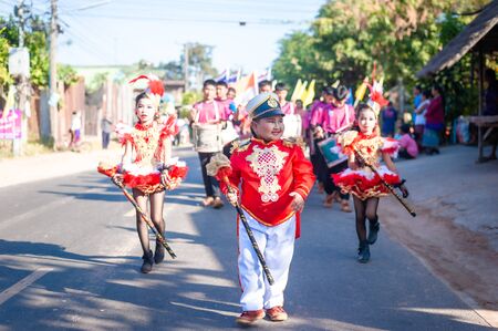 Roi Et, Thailand - December 19,2019 : Unidentified Thai students 6 - 18 years old in ceremony uniform during sport parade on December 19,2019 in Thawat Buri, Roi Et Thani, Thailand.のeditorial素材