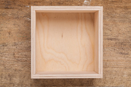 Wooden empty box on background. Top view.