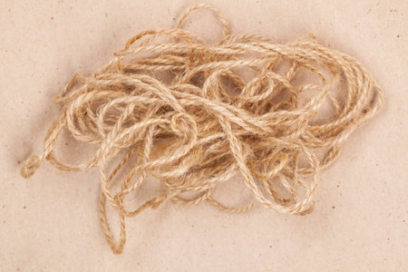 Beige packing paper with a rope