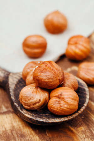 hazelnut, wooden spoonの写真素材