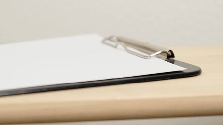 Put Stethoscope in the office of doctors on table. Close up.