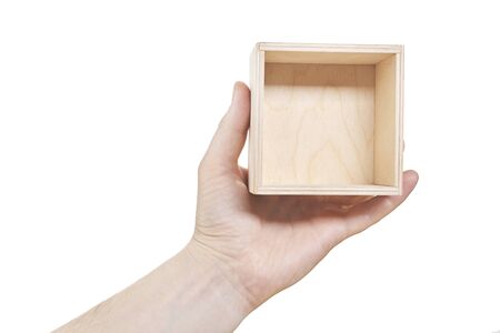 Hand hold Empty wood Box isolated on white background