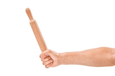 hand with wooden rolling pin isolated on white backgroundの写真素材
